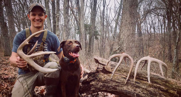 Alex Foster and his dog with some great shed antlers