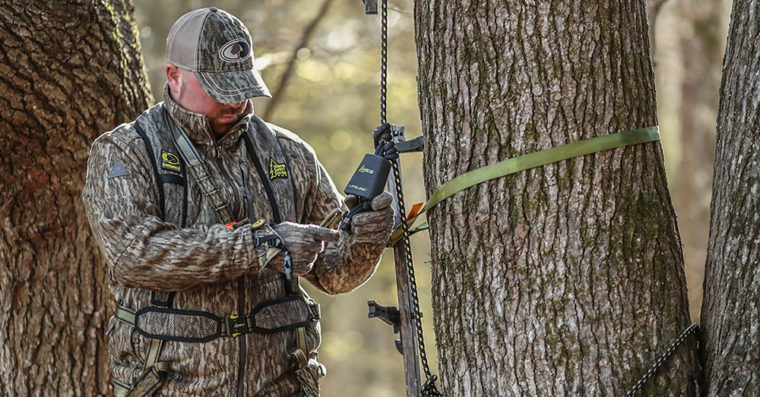 bow hunter in tree stand