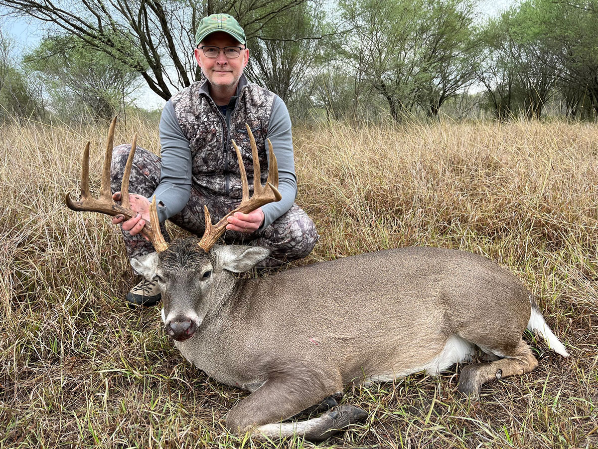 Dr. Bronson Strickland with a nice buck he harvested.